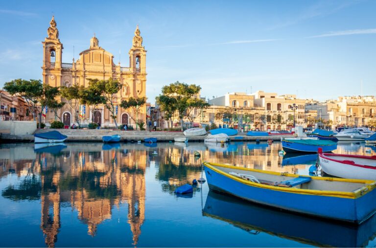 Stock photo of Malta city and boats on water