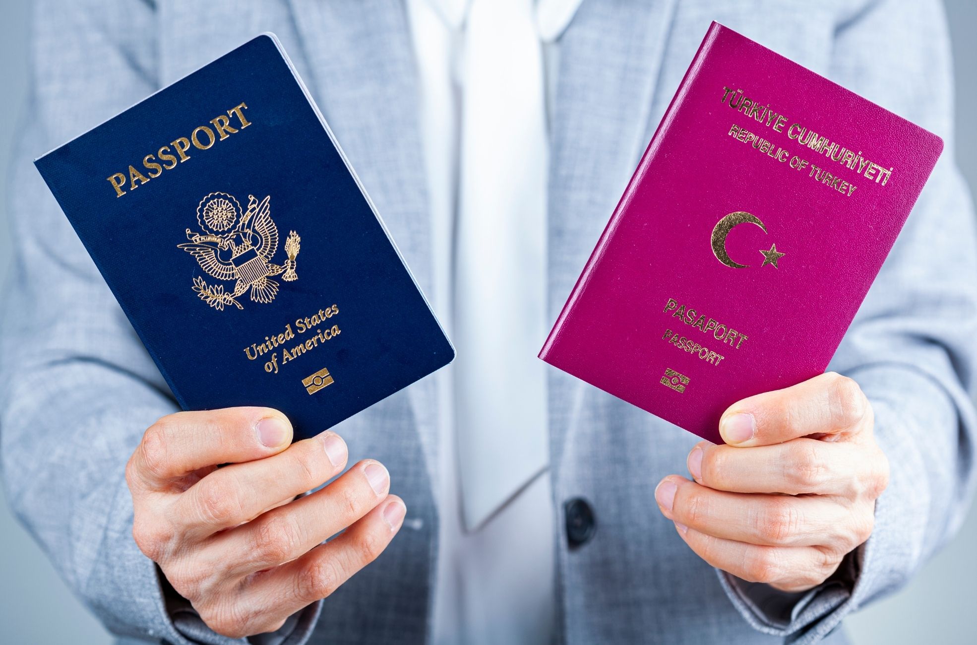 Man Holding Dual Passports