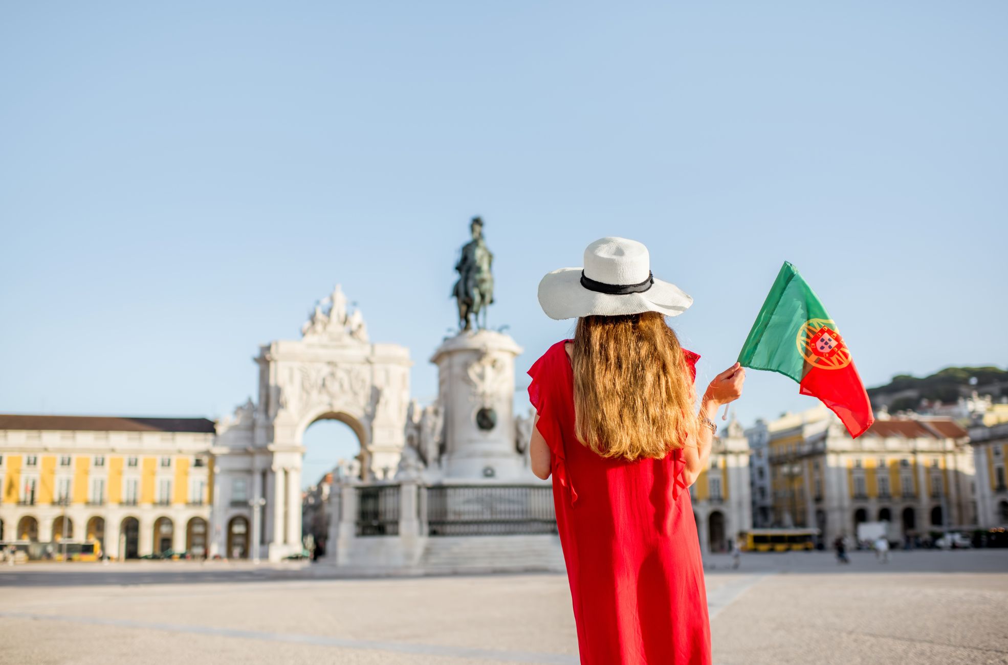 Woman Holding Portuguese Flag In Portugal