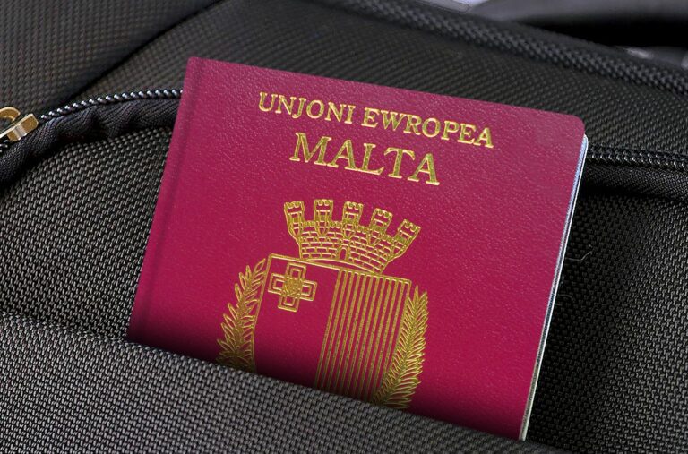 Passport Of Malta In Suitcase